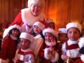 Mrs Claus with little elves